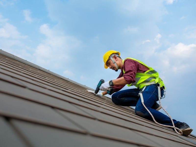 roof repair Roof repair work in progress on a residential home